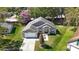 Aerial view of a well-maintained single-Gathering home with a two-car garage and manicured lawn at 1222 Brandy Lake View Cir, Winter Garden, FL 34787