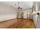 Spacious primary bedroom features tray ceilings, and hardwood floors at 1227 Baypoint Ct, Longwood, FL 32750