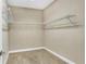 Walk in closet with carpet and shelving at 1386 Hazeldene Mnr, Deland, FL 32724