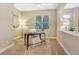 Bright office with a large window, neutral carpet, and stylish decor at 1386 Hazeldene Mnr, Deland, FL 32724