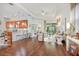Open-concept living room seamlessly connects to a modern kitchen, perfect for entertaining and Gathering gatherings at 1684 Victoria Gardens Dr, Deland, FL 32724