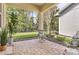 Charming patio area with comfortable seating and a view of the backyard at 1684 Victoria Gardens Dr, Deland, FL 32724