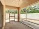 Cozy screened-in patio offers an inviting area for relaxation and outdoor enjoyment at 1711 Francisco St, The Villages, FL 32159