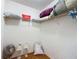 Spacious walk-in closet with shelves for storage at 1711 Francisco St, The Villages, FL 32159