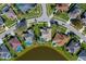 Aerial view of a residential neighborhood featuring homes with private pools and well-maintained landscaping at 1792 Arash Cir, Port Orange, FL 32128