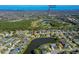 Wide aerial shot showcases the location of a home near an elementary school within a scenic residential area at 1792 Arash Cir, Port Orange, FL 32128