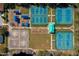 Aerial shot shows a community recreation center with tennis courts, playgrounds, and sports areas for residents at 1792 Arash Cir, Port Orange, FL 32128