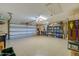 This garage is spacious with an epoxy floor, shelving, and plenty of room for storage at 1792 Arash Cir, Port Orange, FL 32128