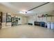 Spacious and well-organized garage with ample storage space and epoxy flooring at 1792 Arash Cir, Port Orange, FL 32128