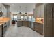 Updated kitchen showcasing granite counters, stainless appliances, and a breakfast bar at 1792 Arash Cir, Port Orange, FL 32128