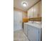 Well-organized laundry room with ample cabinet space and washer and dryer at 1792 Arash Cir, Port Orange, FL 32128