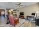 Large open-concept living room features wood floors and eat in kitchen at 1792 Arash Cir, Port Orange, FL 32128