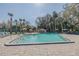 Lovely community pool featuring a brick paver deck, steps into the pool and plenty of sun and shade at 190 Hickory Woods Ct # 15C, Deltona, FL 32725