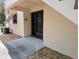 Close-up of condo entrance with decorative wreath, neutral paint, and private entryway at 190 Hickory Woods Ct # 15C, Deltona, FL 32725