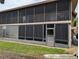 Enclosed patio with screened walls on two stories offers a spacious outdoor living area at 190 Hickory Woods Ct # 15C, Deltona, FL 32725
