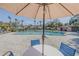 Relax poolside with ample shade, and enjoy this beautiful community pool and seating area at 190 Hickory Woods Ct # 15C, Deltona, FL 32725