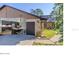 Charming single-Gathering home features stone accents, a two-car garage, and a beautifully landscaped front yard at 210 Sage Brush Trl, Ormond Beach, FL 32174