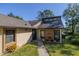 Attractive home showing the roofline, siding, and landscaping around the front of the property at 210 Sage Brush Trl, Ormond Beach, FL 32174