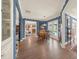 Bright dining area with views of the pool, French doors, and easy access to the kitchen and living room at 2149 Hontoon Rd, Deland, FL 32720