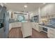 Bright kitchen with stainless steel appliances, an island, tiled backsplash, and ample counter space at 2149 Hontoon Rd, Deland, FL 32720