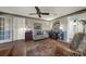 Comfortable living room with traditional decor and wood floors at 2149 Hontoon Rd, Deland, FL 32720