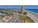 Picturesque aerial view of a beachside condo near a residential neighborhood at 2200 N Atlantic Ave # 1201, Daytona Beach, FL 32118