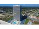 Condo building with a modern design offering pool and views of neighborhood at 2200 N Atlantic Ave # 1201, Daytona Beach, FL 32118