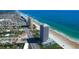 Stunning aerial view of beachfront condos with gorgeous views of the Atlantic Ocean and beautiful sandy beach at 2200 N Atlantic Ave # 1201, Daytona Beach, FL 32118