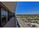 Expansive balcony view overlooking city streets and lush landscapes at 2200 N Atlantic Ave # 1201, Daytona Beach, FL 32118