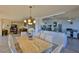 Open dining and kitchen area, features large window with ocean views at 2200 N Atlantic Ave # 1201, Daytona Beach, FL 32118