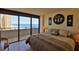 Main bedroom with a large balcony overlooking the ocean at 2200 N Atlantic Ave # 1201, Daytona Beach, FL 32118