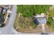 Aerial view of a home with mature trees on a corner lot at 2240 Conway Dr, Deltona, FL 32738