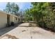 Large concrete patio in backyard adjacent to house at 2240 Conway Dr, Deltona, FL 32738