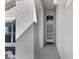 View of a white front door with a decorative window above it at 2274 Stonehedge Loop, Kissimmee, FL 34743
