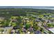 Aerial view of the community showcasing large lots, landscaping, and proximity to area attractions at 2301 Angel Fish Loop, Leesburg, FL 34748
