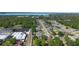 Community aerial view showcasing landscaping, quiet streets, and proximity to a large lake at 2301 Angel Fish Loop, Leesburg, FL 34748