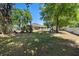 Expansive backyard with plenty of space for outdoor entertaining and recreation at 2301 Angel Fish Loop, Leesburg, FL 34748