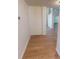 Hallway with light wood-look flooring leading to the other rooms at 2301 Angel Fish Loop, Leesburg, FL 34748