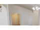 Bright living room with neutral walls and trim, and a clear view into the dining area at 2301 Angel Fish Loop, Leesburg, FL 34748