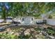 Backyard shed providing ample storage space for tools and equipment at 2301 Angel Fish Loop, Leesburg, FL 34748