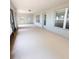 Enclosed sunroom with abundant natural light at 2301 Angel Fish Loop, Leesburg, FL 34748