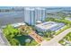 An aerial shot showcasing the community, water views, manicured landscaping, and resort-style amenities at 241 Riverside Dr # 601, Daytona Beach, FL 32117