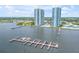Scenic aerial view of waterfront condos with boat docks, showcasing the building's convenient water access at 241 Riverside Dr # 601, Daytona Beach, FL 32117