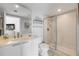 Bathroom with modern fixtures, vanity with stone countertop, and a glass-enclosed shower at 241 Riverside Dr # 601, Daytona Beach, FL 32117