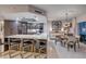 Modern kitchen with stone countertops and stainless steel appliances including eat in breakfast nook at 241 Riverside Dr # 601, Daytona Beach, FL 32117
