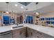 Open concept kitchen view with island marble countertops and upscale finishes at 241 Riverside Dr # 601, Daytona Beach, FL 32117