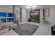 Well-decorated living room with a modern fireplace, sleek furniture, water view, and a stylish decor at 241 Riverside Dr # 601, Daytona Beach, FL 32117