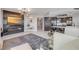 Spacious living room featuring a sleek fireplace, modern lighting, and elegant decor at 241 Riverside Dr # 601, Daytona Beach, FL 32117