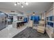Spacious living room featuring an open layout into the kitchen and modern decor at 241 Riverside Dr # 601, Daytona Beach, FL 32117