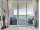 View from the living room to the waterfront balcony at 241 Riverside Dr # 601, Daytona Beach, FL 32117